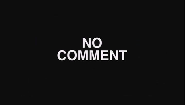 white text reading 'NO COMMENT' on a black background.